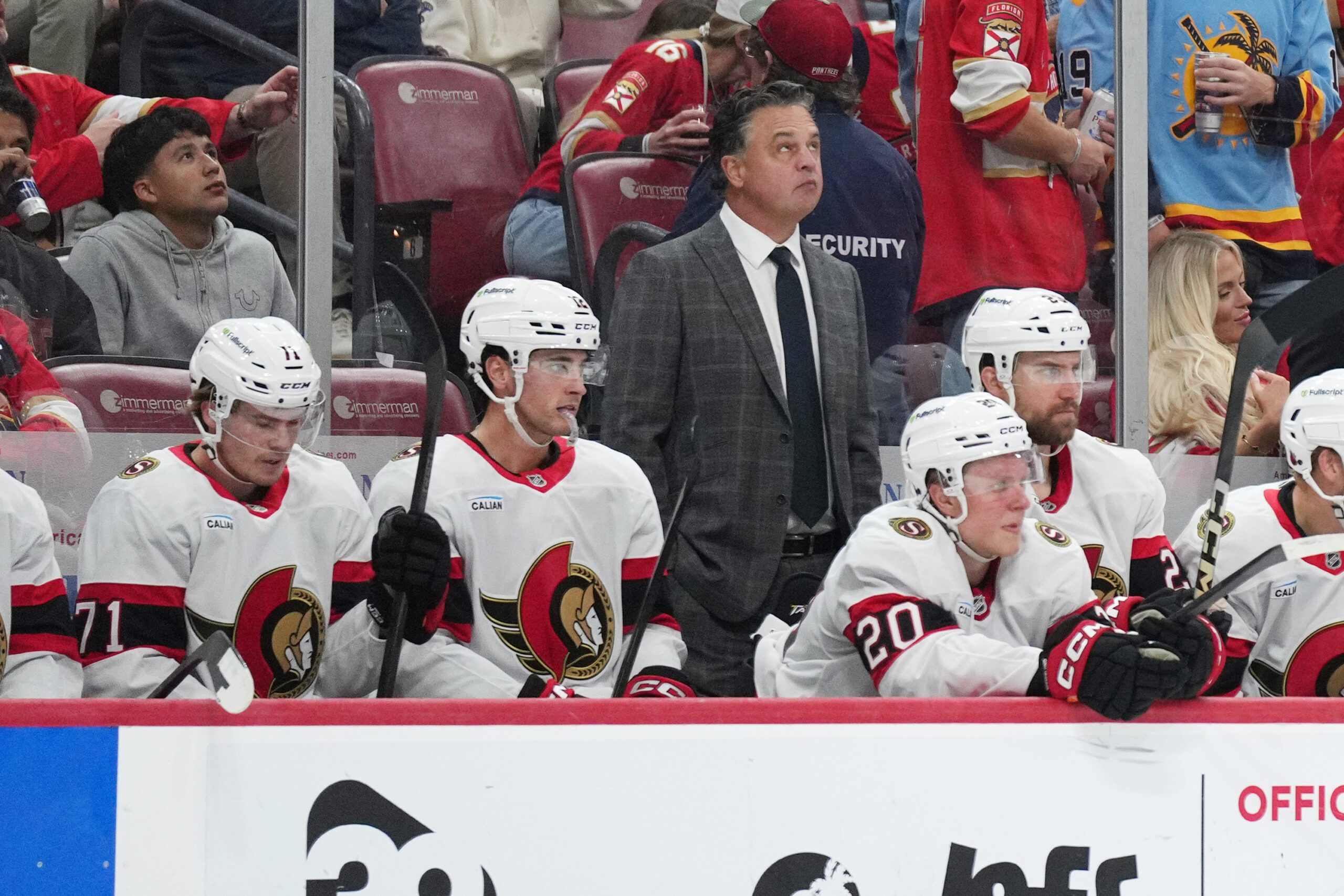 Oct 11, 2025; Sunrise, Florida, USA;  Ottawa Senators head coach Travis green looks on during the second period against the Florida Panthers at Amerant Bank Arena. Mandatory Credit: Jim Rassol-Imagn Images