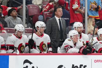 Oct 11, 2025; Sunrise, Florida, USA;  Ottawa Senators head coach Travis green looks on during the second period against the Florida Panthers at Amerant Bank Arena. Mandatory Credit: Jim Rassol-Imagn Images