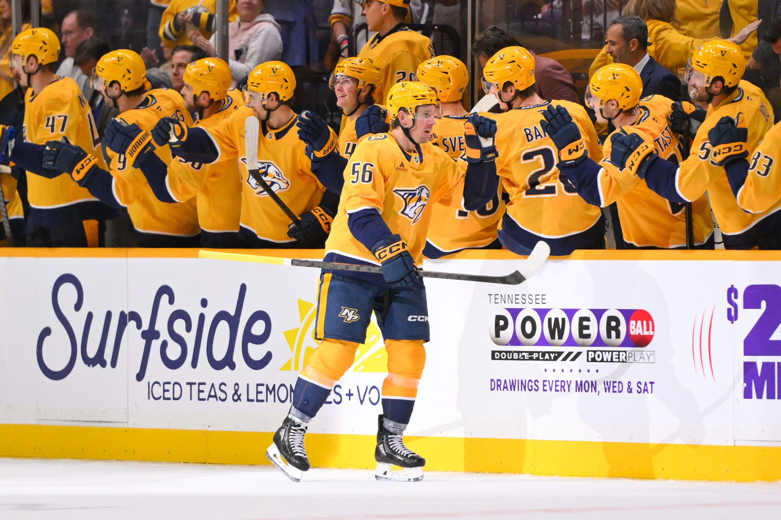 Oct 11, 2025; Nashville, Tennessee, USA;  Nashville Predators left wing Erik Haula (56) celebrates with his teammates after scoring a goal against the Utah Mammoth during the second period at Bridgestone Arena. Mandatory Credit: Steve Roberts-Imagn Images