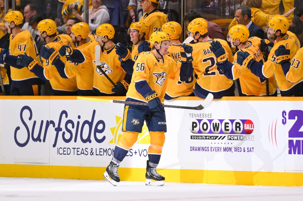 Oct 11, 2025; Nashville, Tennessee, USA; Nashville Predators left wing Erik Haula (56) celebrates with his teammates after scoring a goal against the Utah Mammoth during the second period at Bridgestone Arena. Mandatory Credit: Steve Roberts-Imagn Images