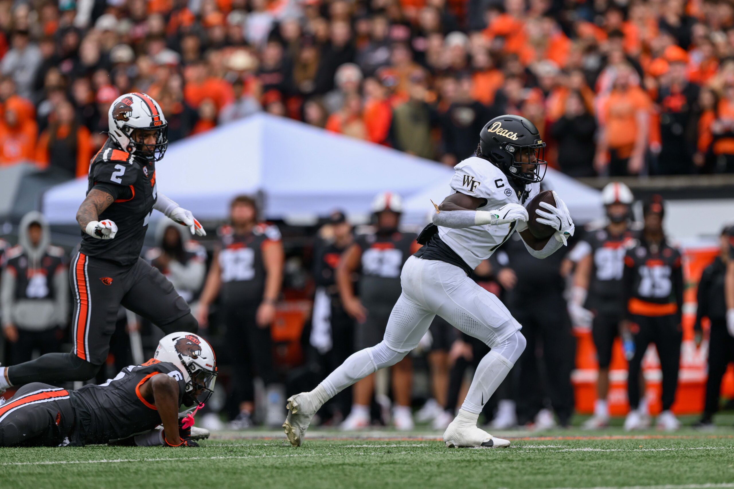 Oct 11, 2025; Corvallis, Oregon, USA; Wake Forest Demon Deacons running back Demond Claiborne (1) runs the ball during the first half against the Oregon State Beavers at Reser Stadium. Mandatory Credit: Craig Strobeck-Imagn Images