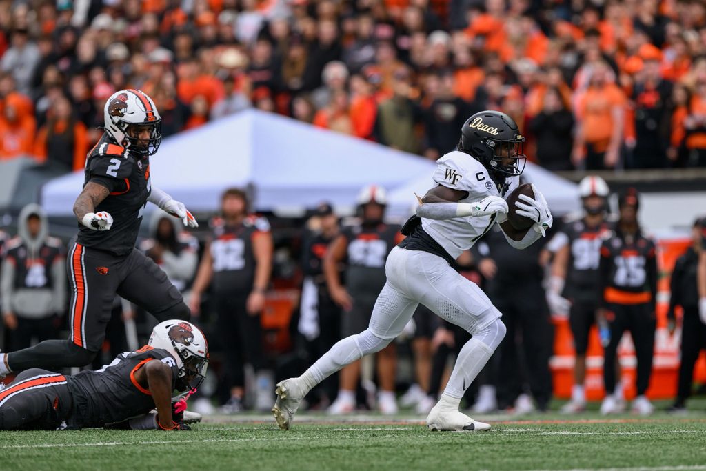 Oct 11, 2025; Corvallis, Oregon, USA; Wake Forest Demon Deacons running back Demond Claiborne (1) runs the ball during the first half against the Oregon State Beavers at Reser Stadium. Mandatory Credit: Craig Strobeck-Imagn Images
