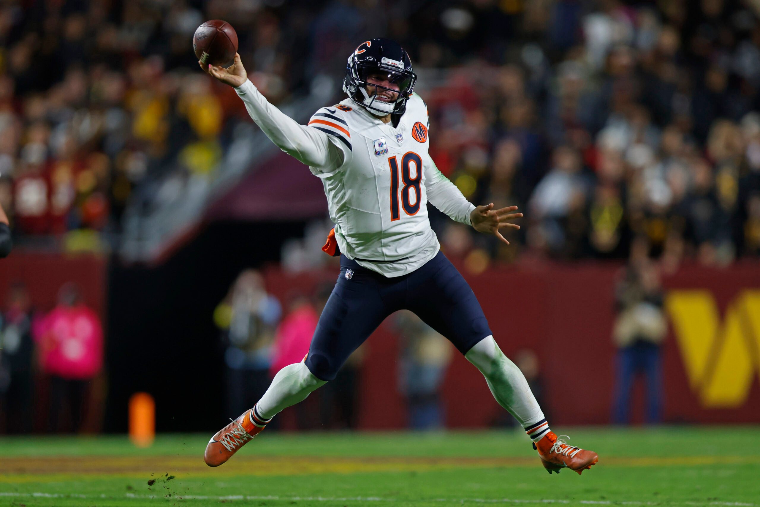 Oct 13, 2025; Landover, Maryland, USA; Chicago Bears quarterback Caleb Williams (18) throws the ball against the Washington Commanders during the third quarter at Northwest Stadium. Mandatory Credit: Peter Casey-Imagn Images