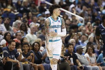 Oct 15, 2025; Greensboro, North Carolina, USA; Charlotte Hornets guard LaMelo Ball (1) celebrates after making a three-poiunt basket during the second half against the Memphis Grizzlies at First Horizon Coliseum. Mandatory Credit: Brian Westerholt-Imagn Images