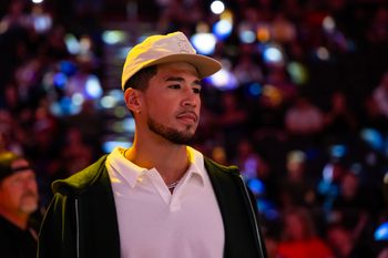 Oct 14, 2025; Phoenix, Arizona, USA; Phoenix Suns guard Devin Booker against the Los Angeles Lakers during an NBA preseason game at Mortgage Matchup Center. Mandatory Credit: Mark J. Rebilas-Imagn Images
