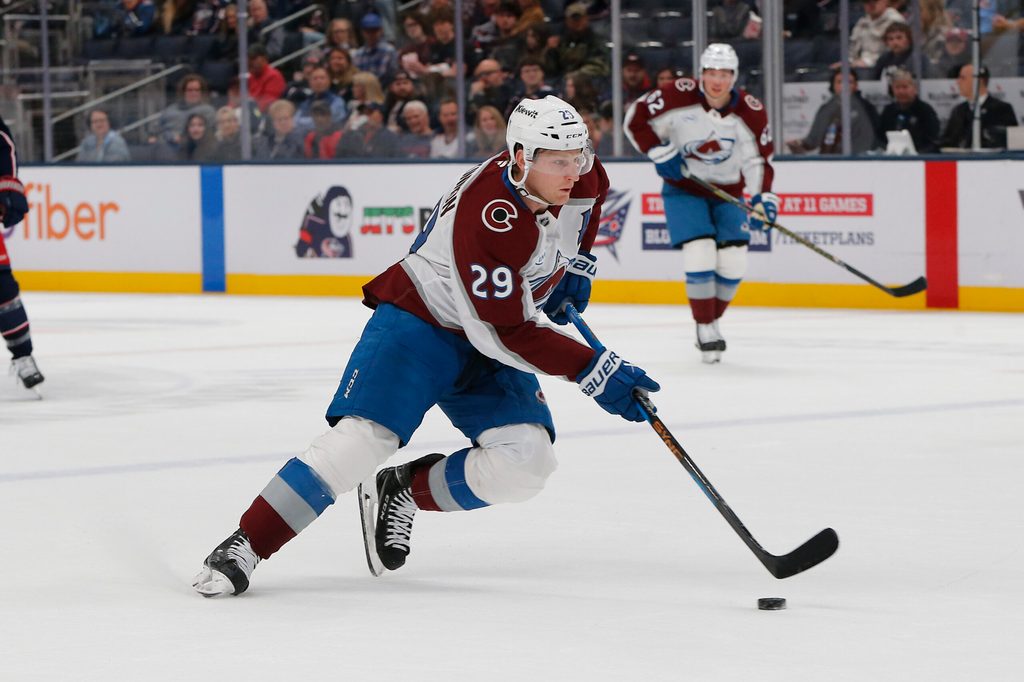 Oct 16, 2025; Columbus, Ohio, USA; Colorado Avalanche center Nathan MacKinnon (29) controls the puck against the Columbus Blue Jackets during the first period at Nationwide Arena. Mandatory Credit: Russell LaBounty-Imagn Images