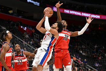 Oct 16, 2025; Detroit, Michigan, USA; Detroit Pistons guard Cade Cunningham (2) shoots the ball against Washington Wizards center Alex Sarr (20) in the first quarter at Little Caesars Arena. Mandatory Credit: Lon Horwedel-Imagn Images