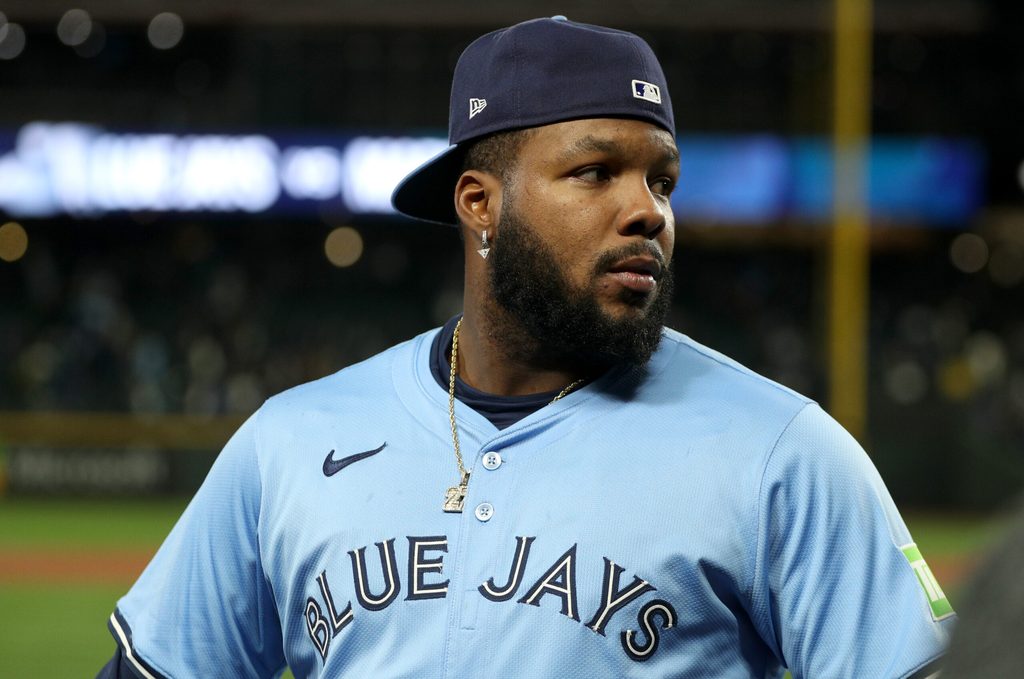 Oct 16, 2025; Seattle, Washington, USA; Toronto Blue Jays first baseman Vladimir Guerrero Jr. (27) celebrates after winning game four of the ALCS round for the 2025 MLB playoffs against the Seattle Mariners at T-Mobile Park. Mandatory Credit: Kevin Ng-Imagn Images