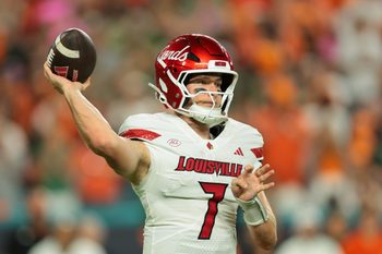 Oct 17, 2025; Miami Gardens, Florida, USA; Louisville Cardinals quarterback Miller Moss (7) throws the football against the Miami Hurricanes during the second quarter at Hard Rock Stadium. Mandatory Credit: Sam Navarro-Imagn Images