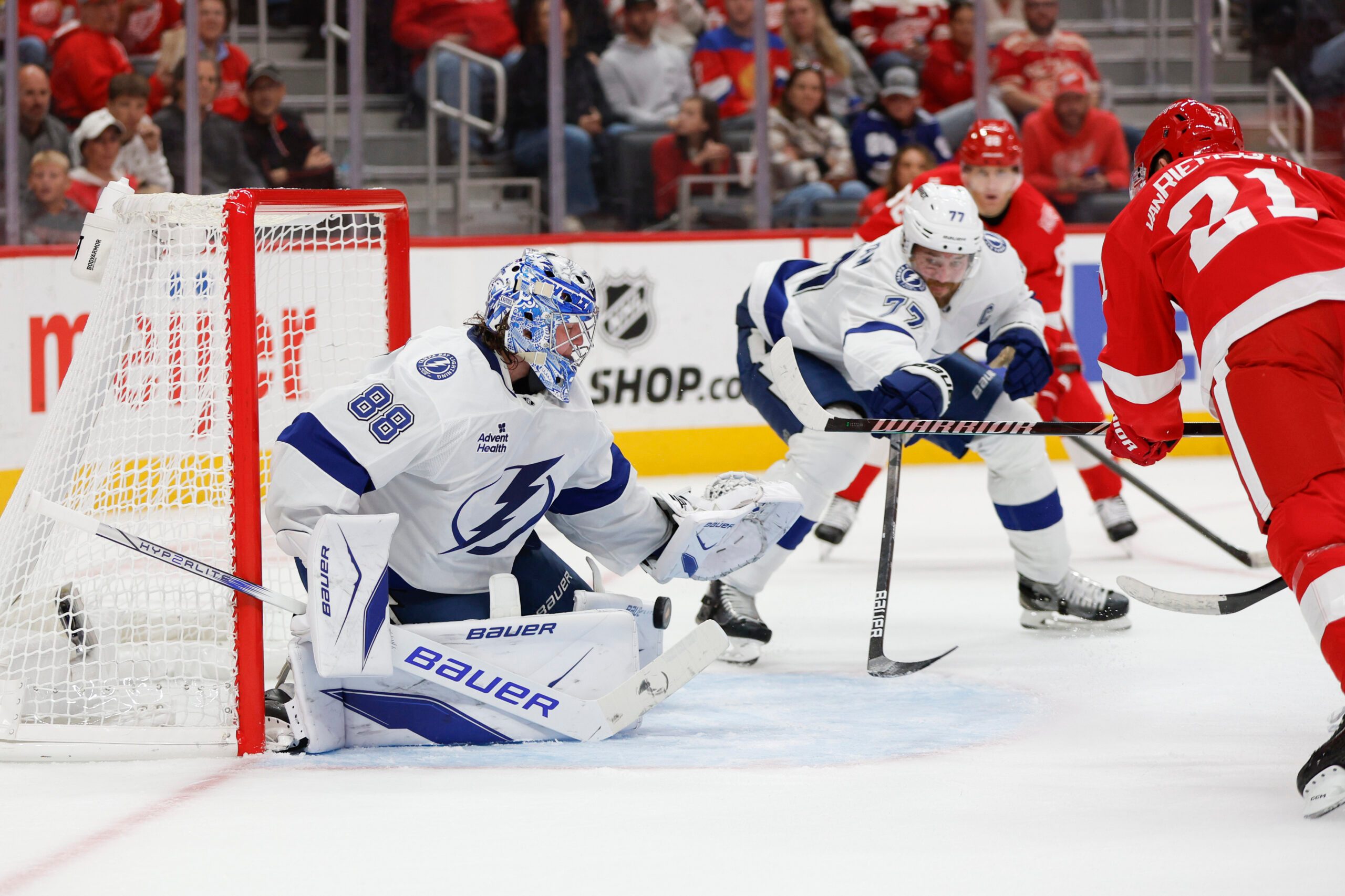Oct 17, 2025; Detroit, Michigan, USA; Tampa Bay Lightning goaltender Andrei Vasilevskiy (88) blocks a shot by Detroit Red Wings left wing James van Riemsdyk (21) during the second period at Little Caesars Arena. Mandatory Credit: Brian Bradshaw Sevald-Imagn Images