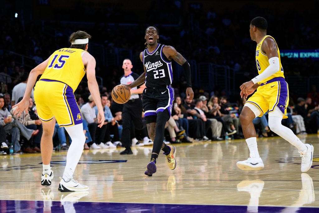 Oct 17, 2025; Los Angeles, California, USA; Sacramento Kings guard Keon Ellis (23) yells down the court during the first half against the Los Angeles Lakers at Crypto.com Arena. Mandatory Credit: William Liang-Imagn Images