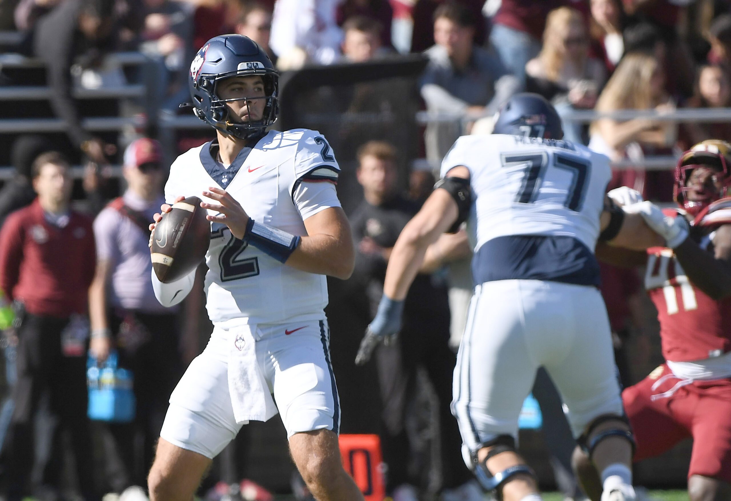 Oct 18, 2025; Chestnut Hill, Massachusetts, USA; UConn Huskies quarterback Joe Fagnano (2) looks to pass the ball during the first half against the Boston College Eagles at Alumni Stadium. Mandatory Credit: Bob DeChiara-Imagn Images