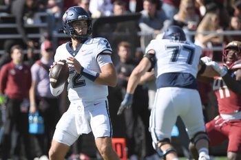Oct 18, 2025; Chestnut Hill, Massachusetts, USA; UConn Huskies quarterback Joe Fagnano (2) looks to pass the ball during the first half against the Boston College Eagles at Alumni Stadium. Mandatory Credit: Bob DeChiara-Imagn Images