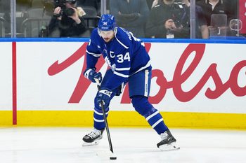Oct 18, 2025; Toronto, Ontario, CAN; Toronto Maple Leafs center Auston Matthews (34) controls the puck during warmups before a game against the Seattle Kraken at Scotiabank Arena. Mandatory Credit: Nick Turchiaro-Imagn Images