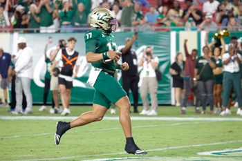 Oct 18, 2025; Tampa, Florida, USA;  South Florida Bulls quarterback Byrum Brown (17) runs for a touchdown during the first quarter against the Florida Atlantic Owls at Raymond James Stadium. Mandatory Credit: Reinhold Matay-Imagn Images