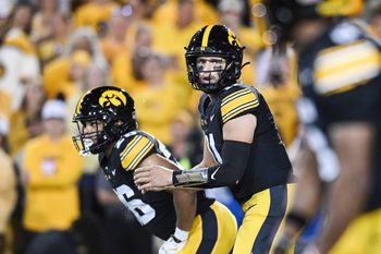 Oct 18, 2025; Iowa City, Iowa, USA; Iowa Hawkeyes quarterback Mark Gronowski (11) looks on against the Penn State Nittany Lions during the second quarter at Kinnick Stadium. Mandatory Credit: Jeffrey Becker-Imagn Images