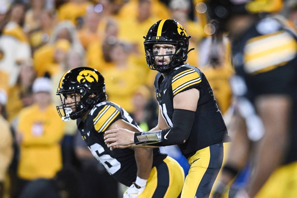 Oct 18, 2025; Iowa City, Iowa, USA; Iowa Hawkeyes quarterback Mark Gronowski (11) looks on against the Penn State Nittany Lions during the second quarter at Kinnick Stadium. Mandatory Credit: Jeffrey Becker-Imagn Images