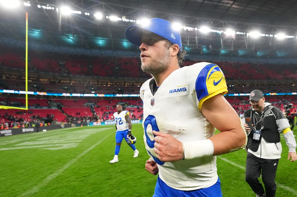 Oct 19, 2025; London, United Kingdom; Los Angeles Rams quarterback Matthew Stafford (9) runs off the field after their win against the Jacksonville Jaguars in an NFL International Series game at Wembley Stadium. Mandatory Credit: Kirby Lee-Imagn Images