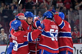 Oct 20, 2025; Montreal, Quebec, CAN; Montreal Canadiens forward Juraj Slafkovsky (20) celebrates with teammates after scoring a goal against the Buffalo Sabres during the third period at the Bell Centre. Mandatory Credit: Eric Bolte-Imagn Images