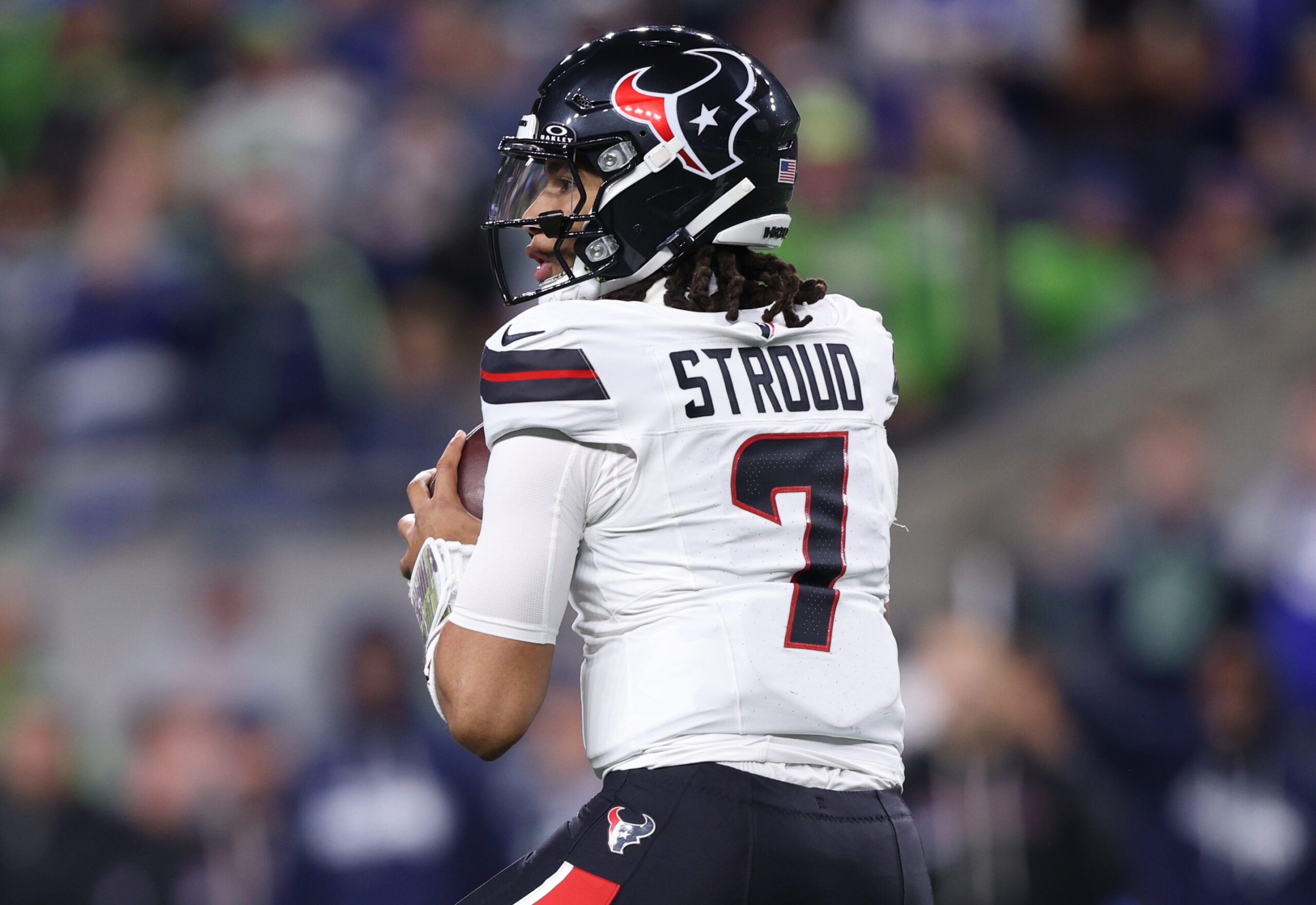Oct 20, 2025; Seattle, Washington, USA; Houston Texans quarterback C.J. Stroud (7) looks to throw a pass during the second quarter against the Seattle Seahawks at Lumen Field. Mandatory Credit: Kevin Ng-Imagn Images