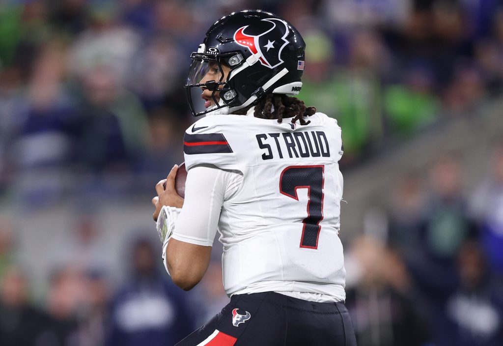 Oct 20, 2025; Seattle, Washington, USA; Houston Texans quarterback C.J. Stroud (7) looks to throw a pass during the second quarter against the Seattle Seahawks at Lumen Field. Mandatory Credit: Kevin Ng-Imagn Images