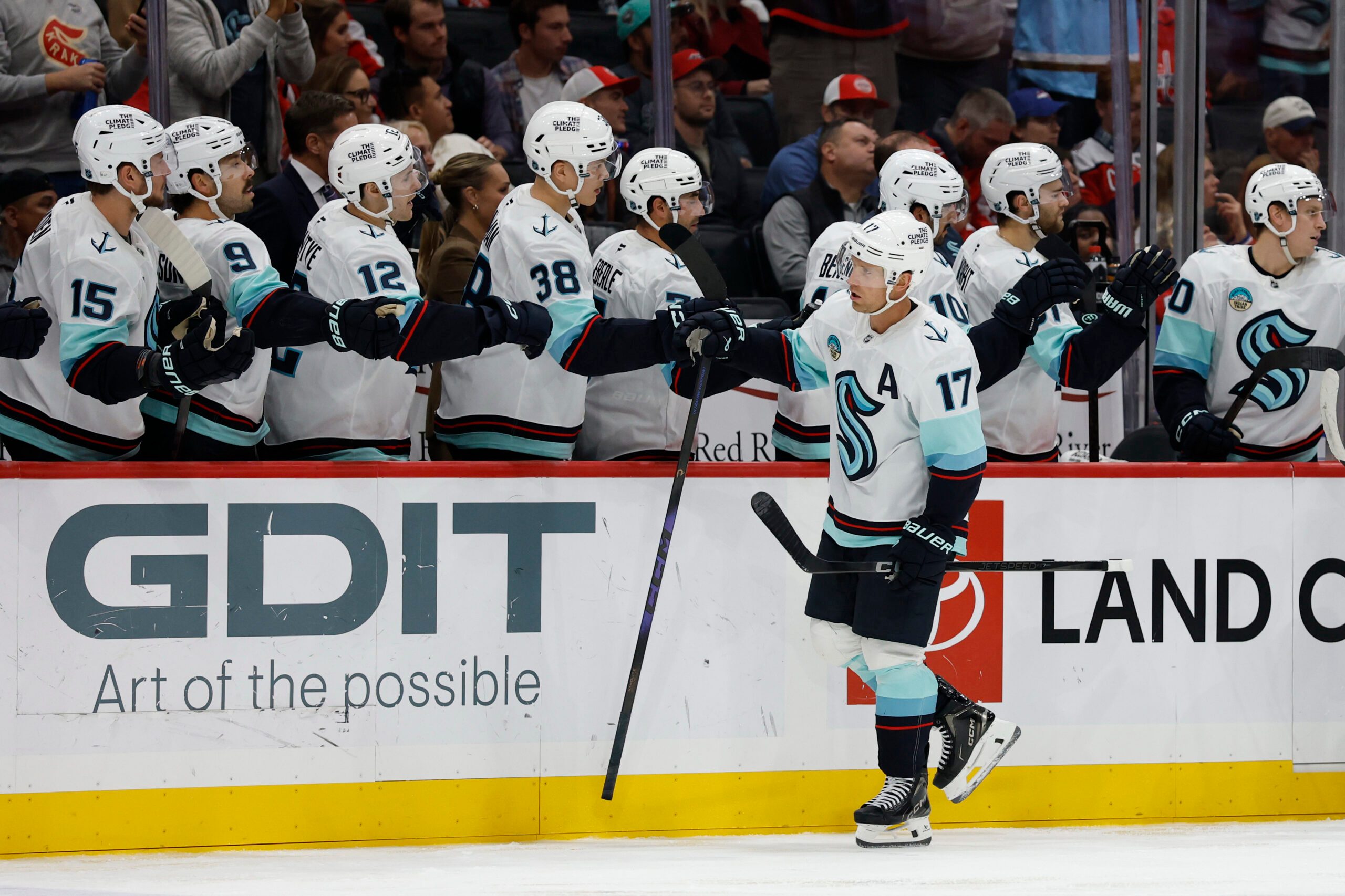 Oct 21, 2025; Washington, District of Columbia, USA; Seattle Kraken left wing Jaden Schwartz (17) celebrates with teammates after scoring a goal against the Washington Capitals during the third period at Capital One Arena. Mandatory Credit: Geoff Burke-Imagn Images