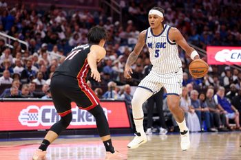 Oct 22, 2025; Orlando, Florida, USA; Orlando Magic forward Paolo Banchero (5) controls the ball against the Miami Heat in the third quarter at Kia Center. Mandatory Credit: Nathan Ray Seebeck-Imagn Images