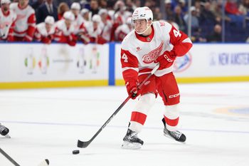 Oct 22, 2025; Buffalo, New York, USA;  Detroit Red Wings defenseman Axel Sandin-Pellikka (44) looks to make a pass during the third period against the Buffalo Sabres at KeyBank Center. Mandatory Credit: Timothy T. Ludwig-Imagn Images