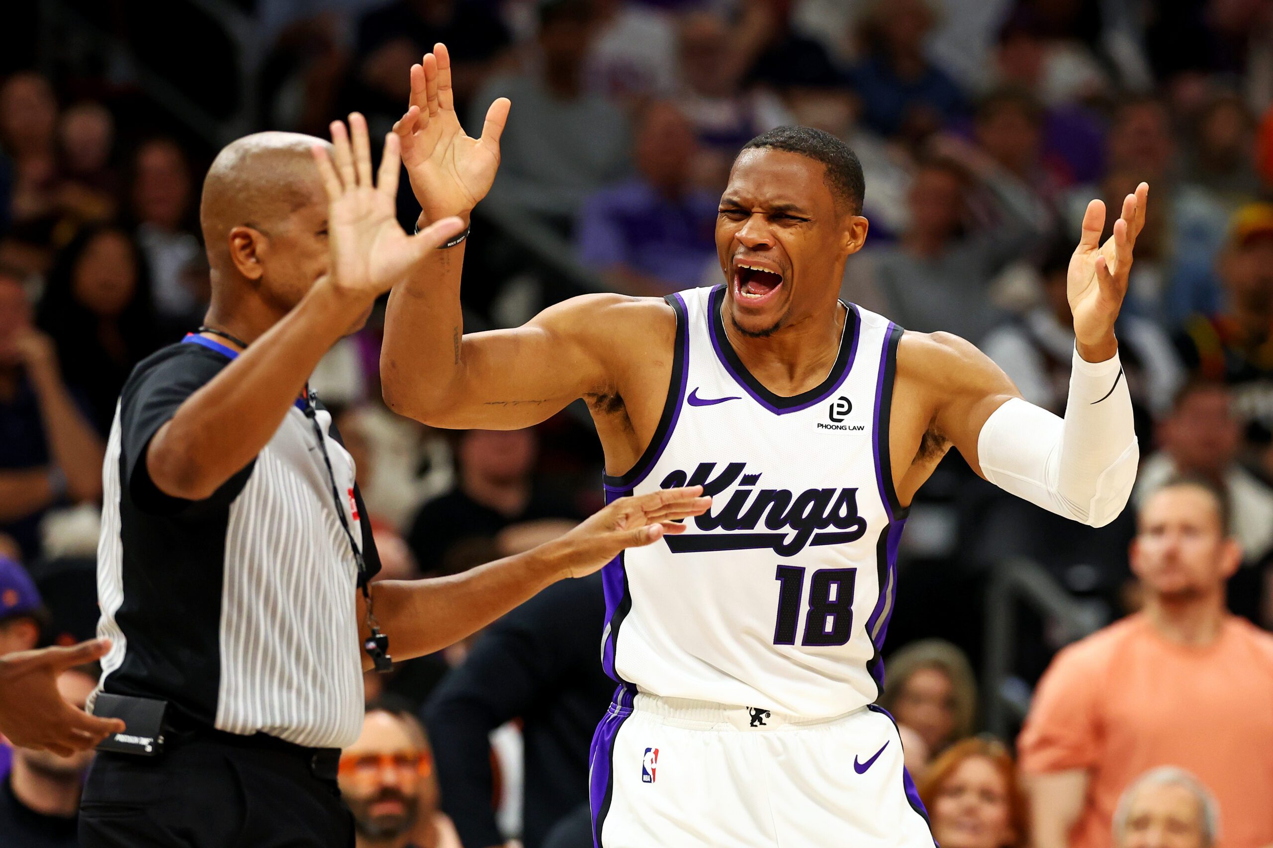 Oct 22, 2025; Phoenix, Arizona, USA; Sacramento Kings guard Russell Westbrook (18) reacts to a call during the second half against the Phoenix Suns at the Mortgage Matchup Center. Mandatory Credit: Mark J. Rebilas-Imagn Images