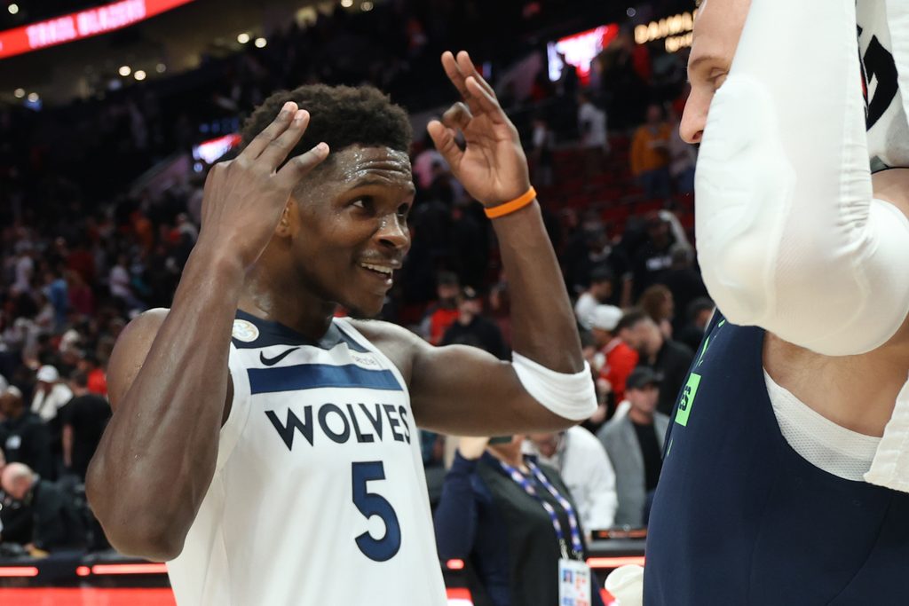 Oct 22, 2025; Portland, Oregon, USA; Minnesota Timberwolves guard Anthony Edwards (5) reacts after a 118-114 win over against the Portland Trail Blazers in the second half at Moda Center. Mandatory Credit: Jaime Valdez-Imagn Images