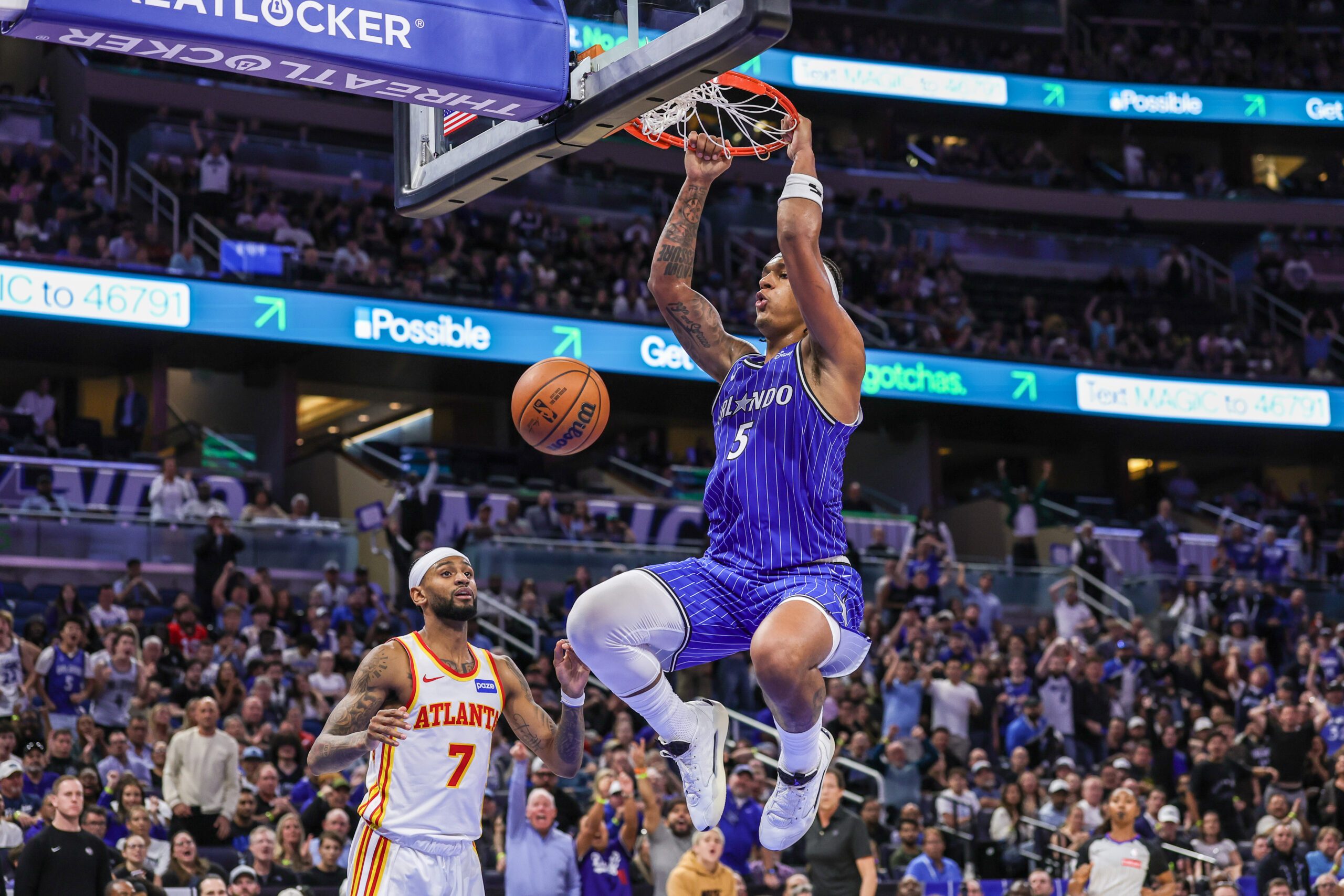 Oct 24, 2025; Orlando, Florida, USA; Orlando Magic forward Paolo Banchero (5) dunks the ball in the fourth quarter against the Atlanta Hawks at Kia Center. Mandatory Credit: Mike Watters-Imagn Images