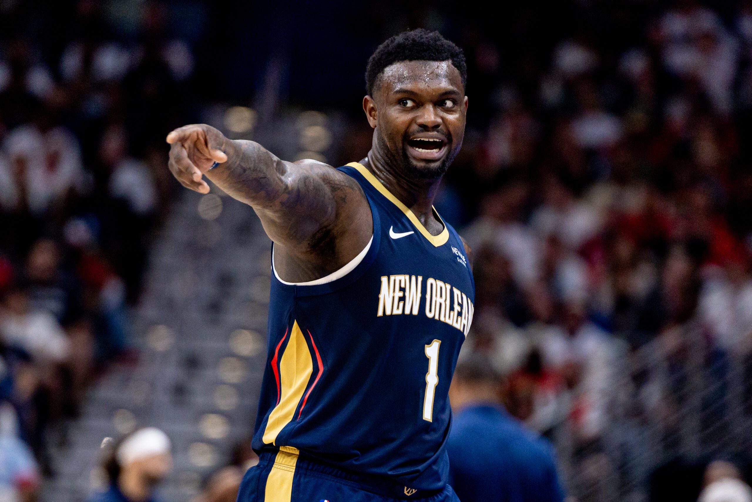 Oct 24, 2025; New Orleans, Louisiana, USA;  New Orleans Pelicans forward Zion Williamson (1) reacts to a play against the San Antonio Spurs during the second half at Smoothie King Center. Mandatory Credit: Stephen Lew-Imagn Images