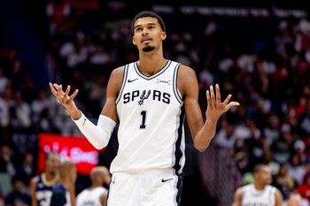 Oct 24, 2025; New Orleans, Louisiana, USA;  San Antonio Spurs forward/center Victor Wembanyama (1) reacts to being fouled by New Orleans Pelicans center Derik Queen (not pictured) during the second half at Smoothie King Center. Mandatory Credit: Stephen Lew-Imagn Images