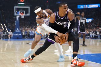 Oct 28, 2025; Oklahoma City, Oklahoma, USA; Oklahoma City Thunder guard Shai Gilgeous-Alexander (2) defends a drive by Sacramento Kings guard Russell Westbrook (18) during the first quarter at Paycom Center. Mandatory Credit: Alonzo Adams-Imagn Images