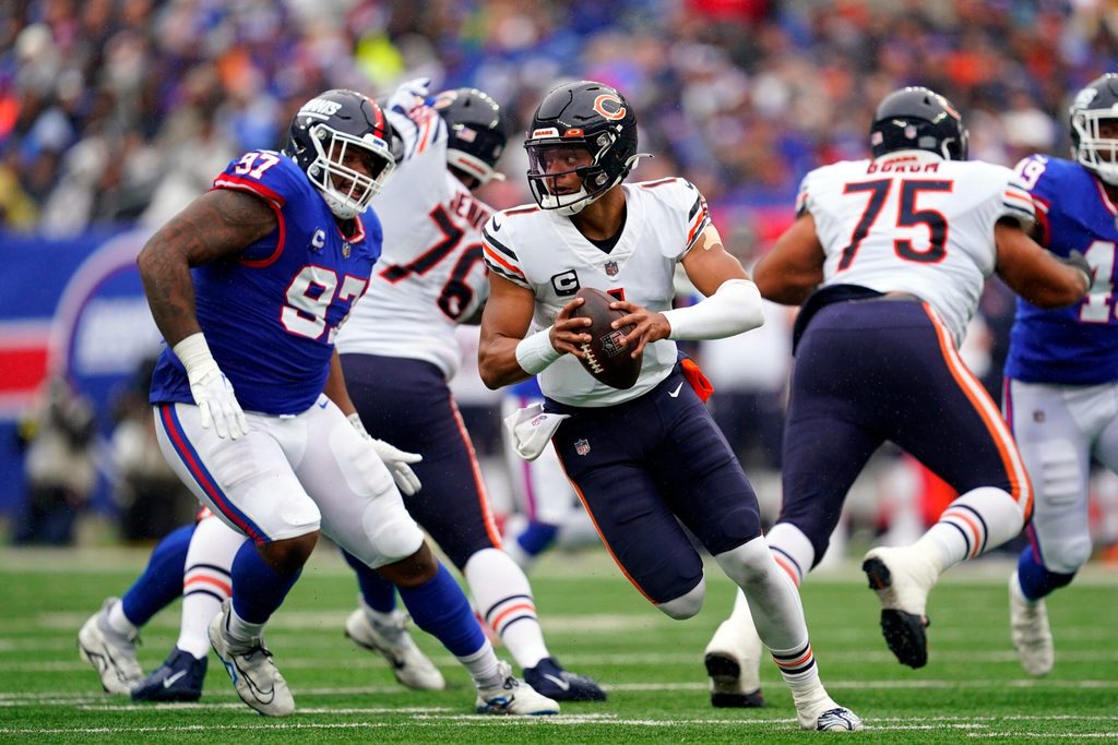 Chicago Bears quarterback Justin Fields (1) scrambles against the New York Giants in the second half. The Giants defeat the Bears, 20-12, at MetLife Stadium on Sunday, Oct. 2, 2022, in East Rutherford.
Nfl Ny Giants Vs Chicago Bears