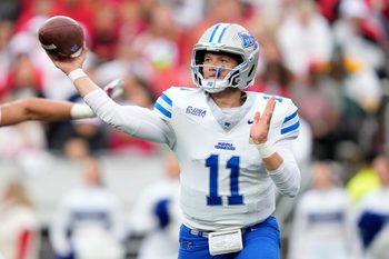 Sep 6, 2025; Madison, Wisconsin, USA; Middle Tennessee Blue Raiders quarterback Nicholas Vattiato (11) throws a pass against the Wisconsin Badgers during the second half at Camp Randall Stadium. Mandatory Credit: Kayla Wolf-Imagn Images