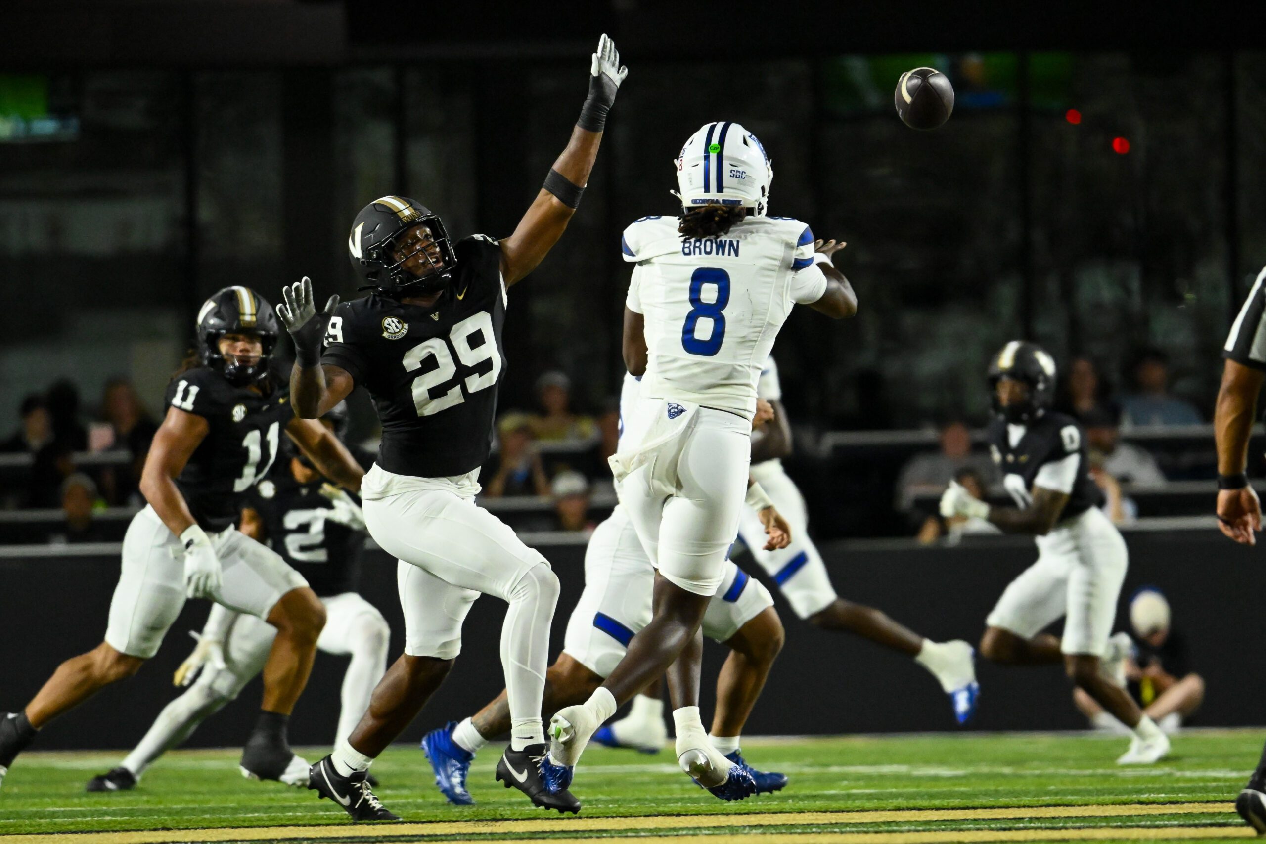 Sep 20, 2025; Nashville, Tennessee, USA;  Vanderbilt Commodores edge Miles Capers (29) flushes Georgia State Panthers quarterback Cameran Brown (8) from the pocket during the first half at FirstBank Stadium. Mandatory Credit: Steve Roberts-Imagn Images