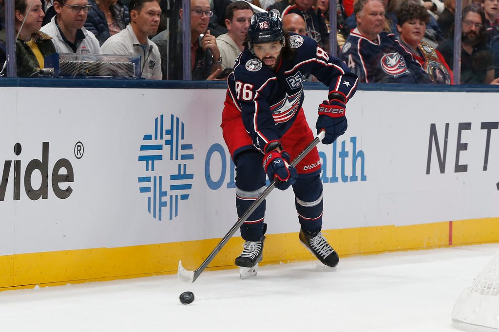 Oct 13, 2025; Columbus, Ohio, USA; Columbus Blue Jackets right wing Kirill Marchenko (86) makes a pass against the New Jersey Devils during the first period at Nationwide Arena. Mandatory Credit: Russell LaBounty-Imagn Images
