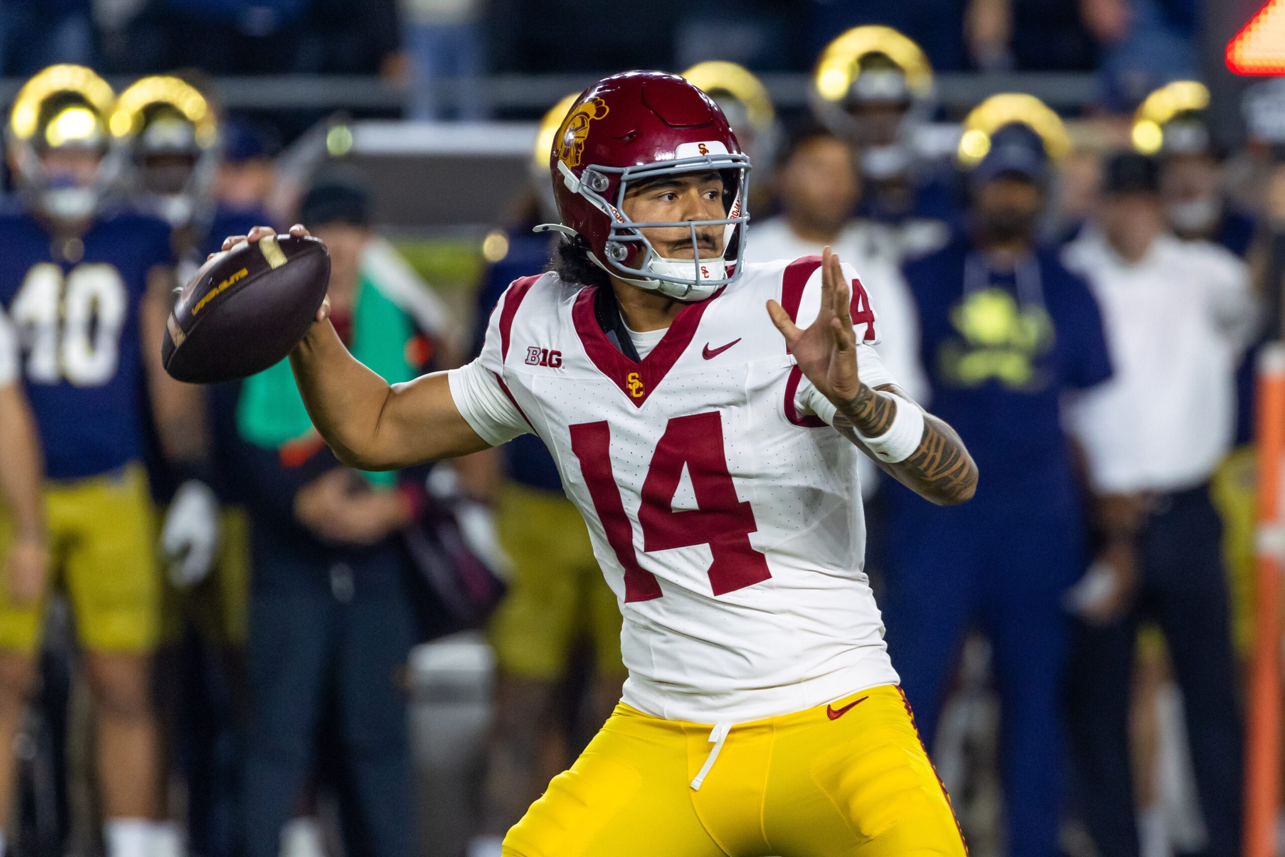 Oct 18, 2025; South Bend, Indiana, USA; Southern California Trojans quarterback Jayden Maiava (14) passes the ball against the Notre Dame Fighting Irish during the first half at Notre Dame Stadium. Mandatory Credit: Michael Caterina-Imagn Images