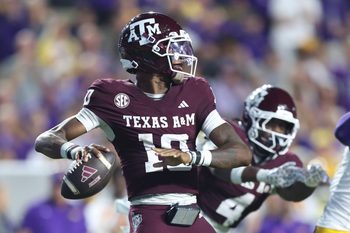 Oct 25, 2025; Baton Rouge, Louisiana, USA; Texas A&M Aggies quarterback Marcel Reed (10) drops to throw during the first half against the Louisiana State Tigers at Tiger Stadium. Mandatory Credit: Stephen Lew-Imagn Images