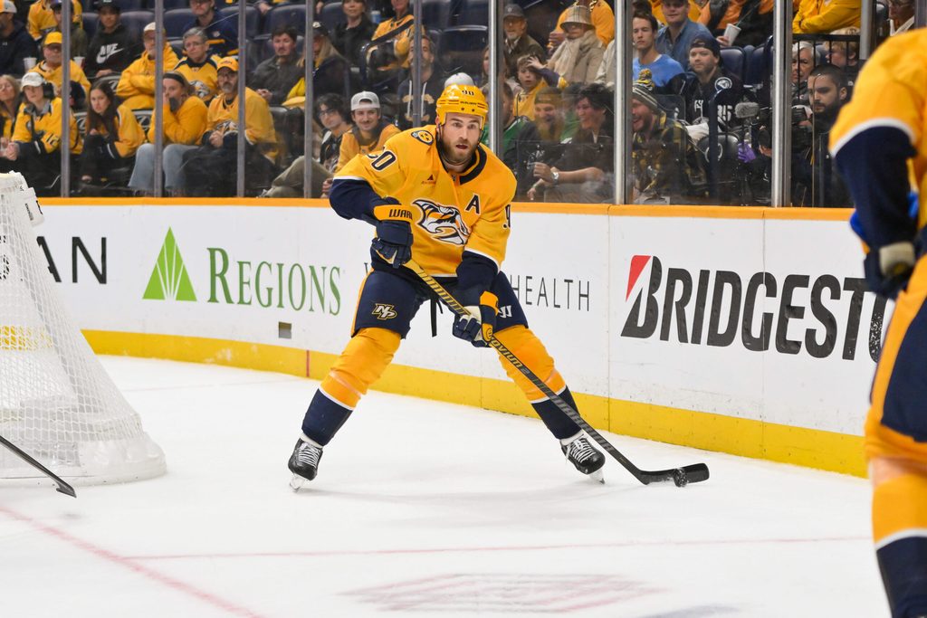 Oct 26, 2025; Nashville, Tennessee, USA; Nashville Predators center Ryan O'Reilly (90) skates behind the net against the Dallas Stars during the third period at Bridgestone Arena. Mandatory Credit: Steve Roberts-Imagn Images