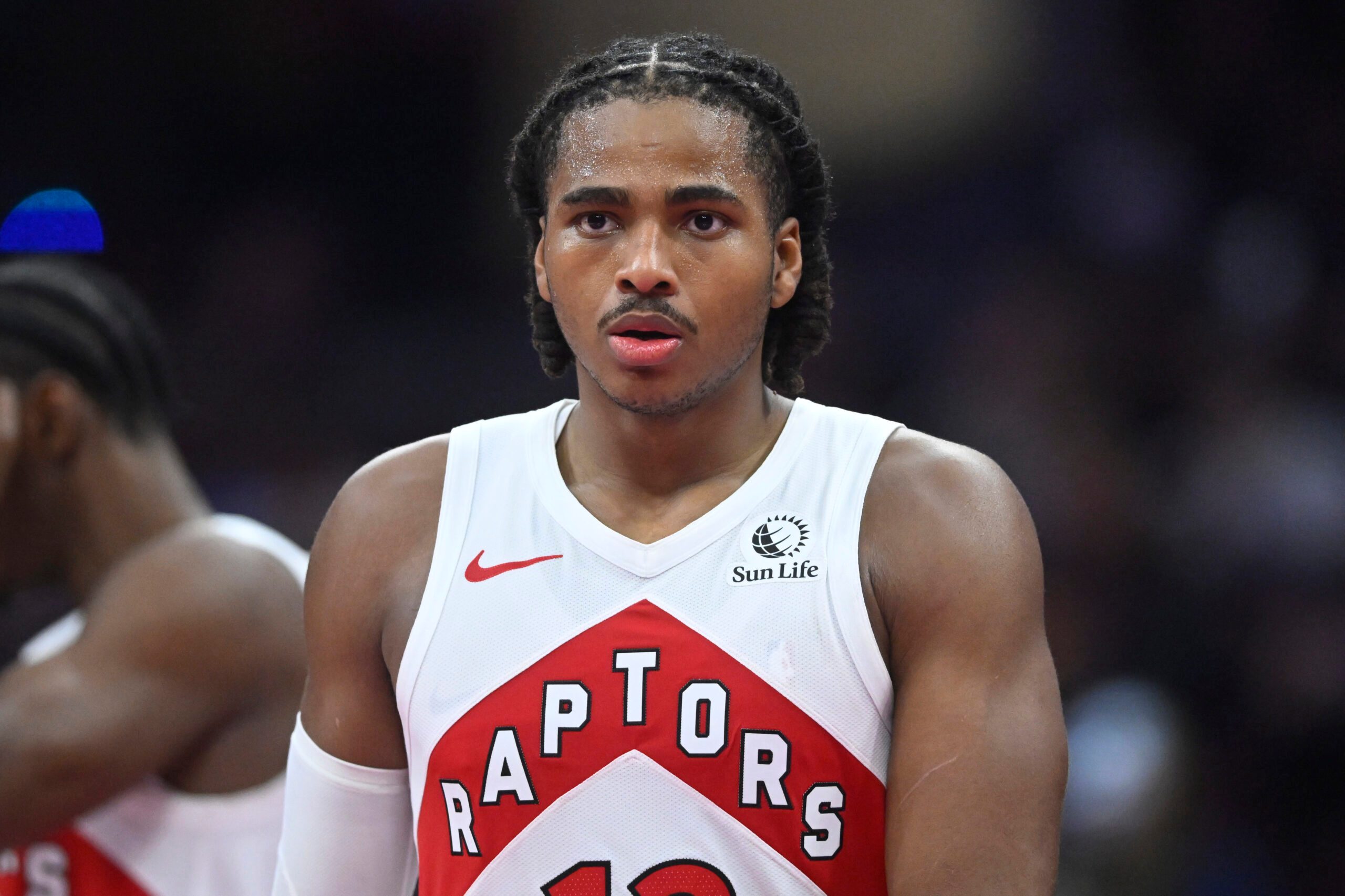 Oct 31, 2025; Cleveland, Ohio, USA; Toronto Raptors forward Collin Murray-Boyles (12) walks on the court in the third quarter against the Cleveland Cavaliers at Rocket Arena. Mandatory Credit: David Richard-Imagn Images
