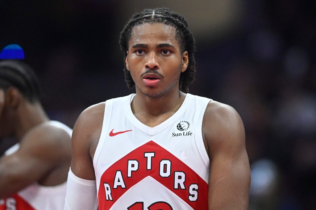 Oct 31, 2025; Cleveland, Ohio, USA; Toronto Raptors forward Collin Murray-Boyles (12) walks on the court in the third quarter against the Cleveland Cavaliers at Rocket Arena. Mandatory Credit: David Richard-Imagn Images
