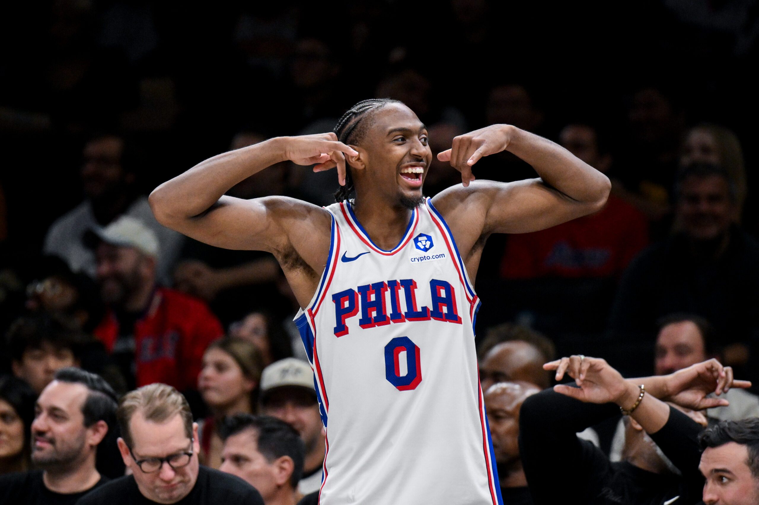 Nov 2, 2025; Brooklyn, New York, USA; Philadelphia 76ers guard Tyrese Maxey (0) flexes his muscles from the bench during the second half against the Brooklyn Nets at Barclays Center. Mandatory Credit: John Jones-Imagn Images