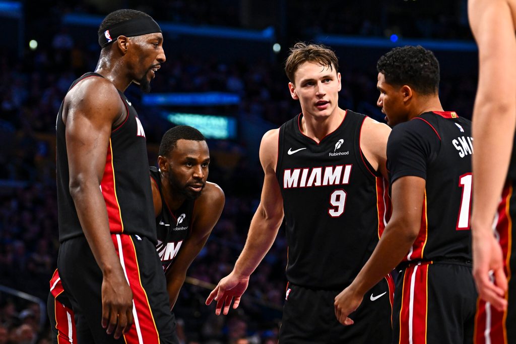 Nov 2, 2025; Los Angeles, California, USA; Miami Heat guard Pelle Larsson (9) meets with teammates during the game against the Los Angeles Lakers during the second half at Crypto.com Arena. Mandatory Credit: Jonathan Hui-Imagn Images