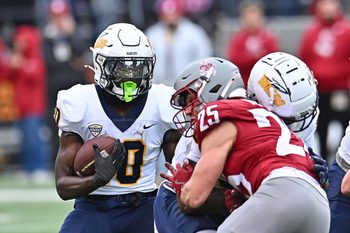 Oct 25, 2025; Pullman, Washington, USA; Toledo Rockets running back Kenji Christian (10) carries the ball against the Washington State Cougars in the second half at Gesa Field at Martin Stadium. Mandatory Credit: James Snook-Imagn Images