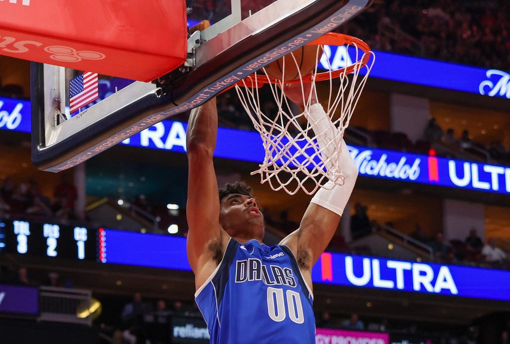 Nov 3, 2025; Houston, Texas, USA; Dallas Mavericks guard Max Christie (00) dunks against the Houston Rockets in the fourth quarter at Toyota Center. Mandatory Credit: Thomas Shea-Imagn Images