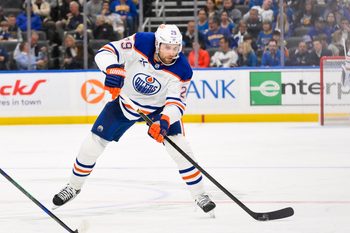Nov 3, 2025; St. Louis, Missouri, USA; Edmonton Oilers center Leon Draisaitl (29) controls the puck against the St. Louis Blues during the third period at Enterprise Center. Mandatory Credit: Jeff Curry-Imagn Images