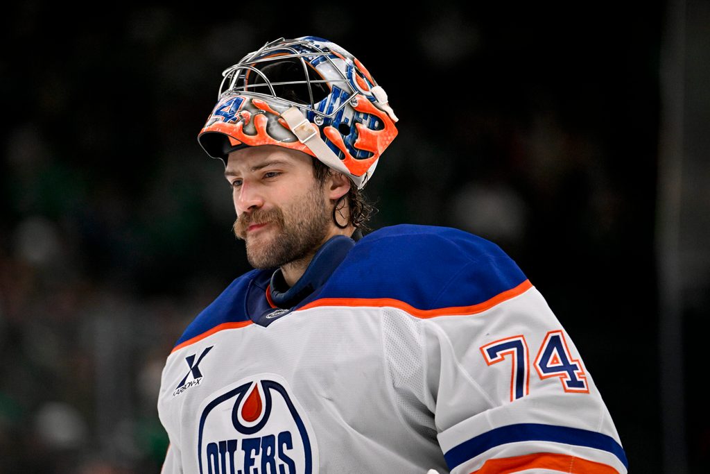 Nov 4, 2025; Dallas, Texas, USA; Edmonton Oilers goaltender Stuart Skinner (74) skates back on the ice during the overtime period against the Dallas Stars at the American Airlines Center. Mandatory Credit: Jerome Miron-Imagn Images
