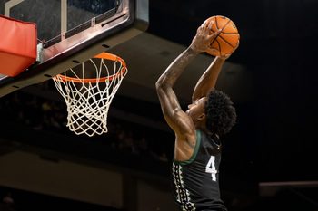 Hawaii guard Dre Bullock dunks the ball as the Oregon Ducks host the Hawaii Rainbow Warriors on Nov. 4, 2025, at Matthew Knight Arena in Eugene, Oregon.